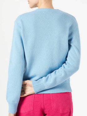 Woman crewneck light blue sweater with Compulsive Shopper jacquard