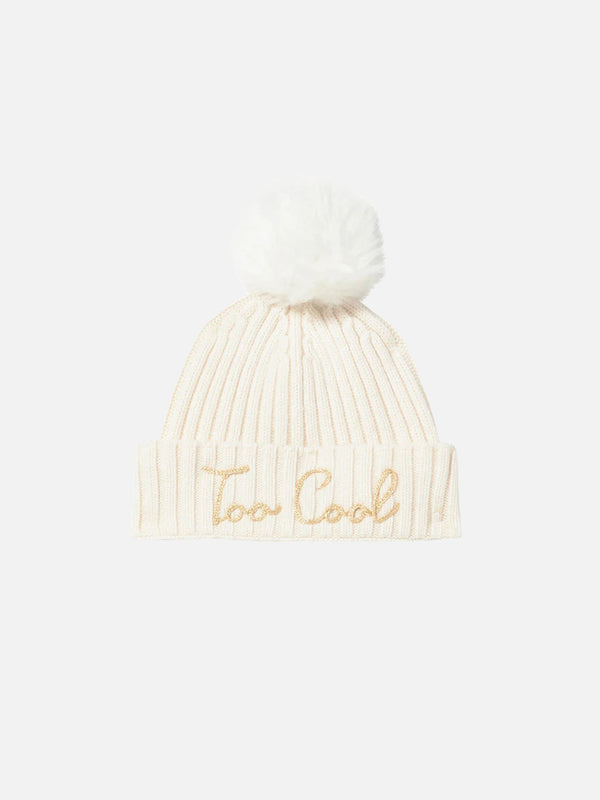 Woman white beanie with pompon