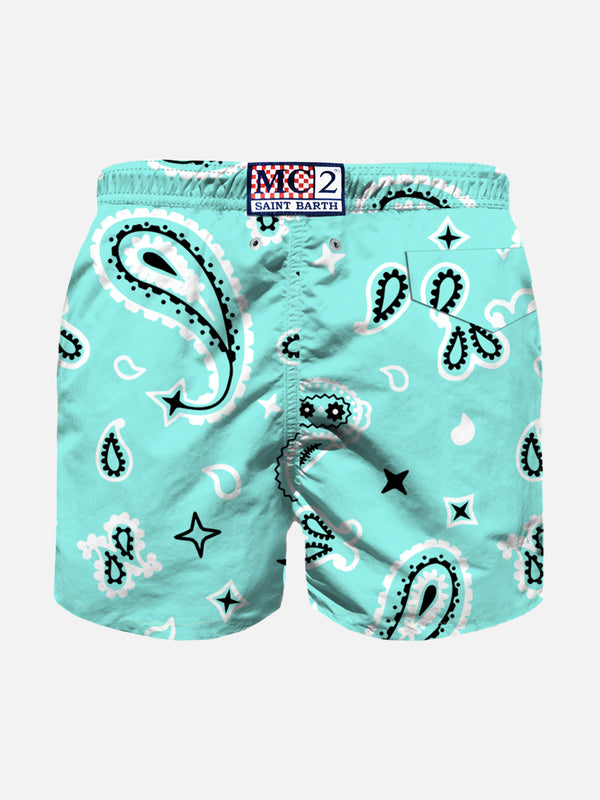 Boy water green swim shorts with bandanna pattern