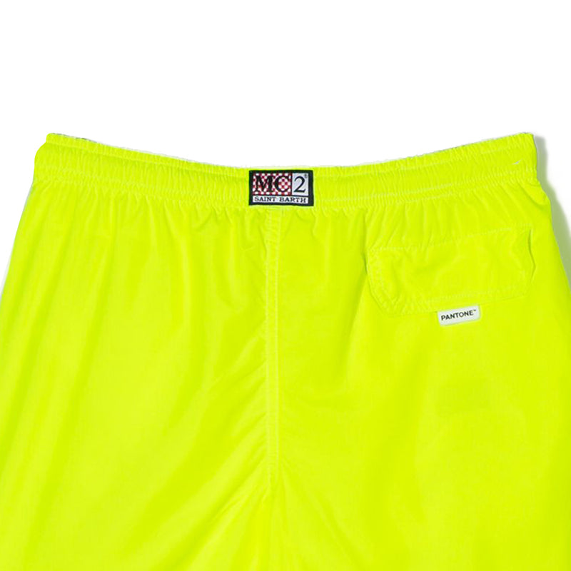 Jungen-Badeshorts aus hellem, fluogelbem Stoff | Pantone™ Sonderausgabe