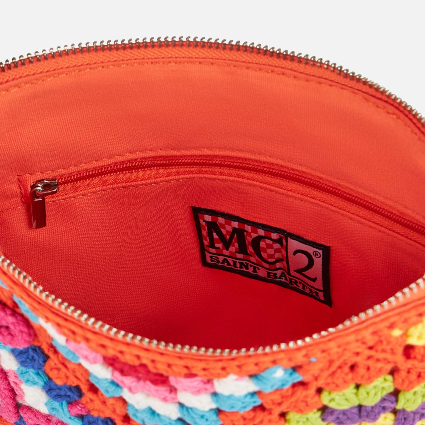 Parisienne orange crochet pouch bag with Saint Barth