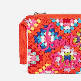 Parisienne orange crochet pouch bag with Saint Barth