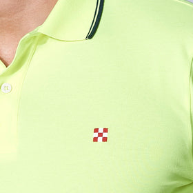 Poloshirt aus Fluo-Piquet in Gelb mit St. Barth-Karologo
