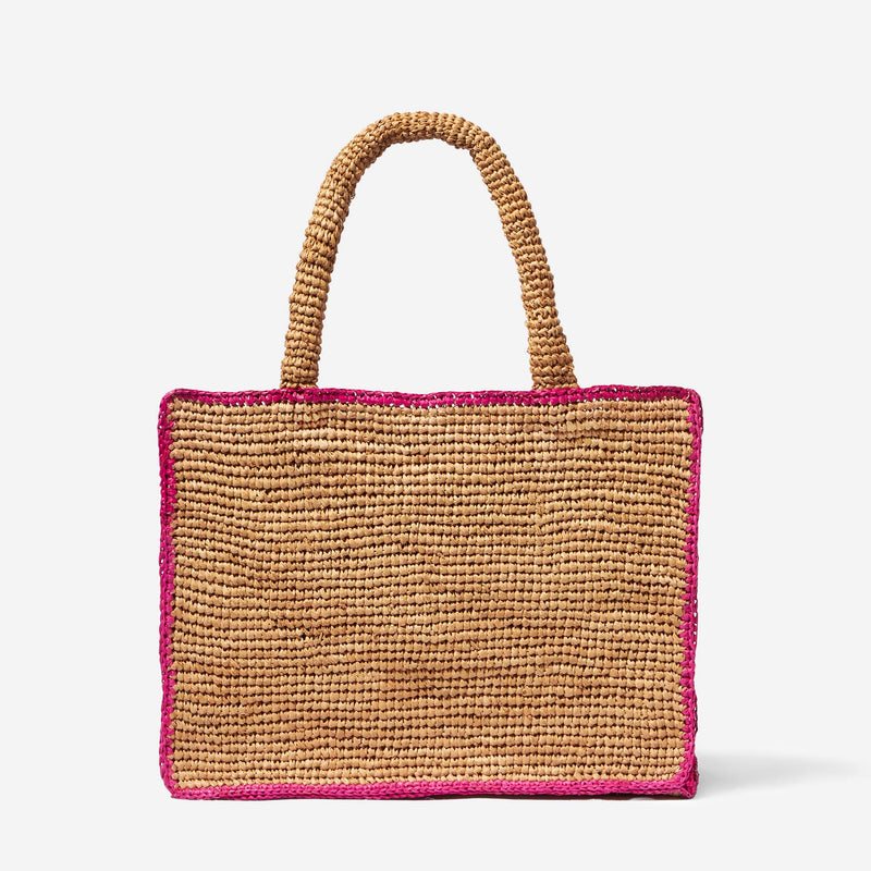 Raffia bag with fuchsia front embroidery