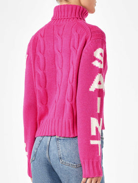 Maglia da donna intrecciata dolcevita rosa fluo