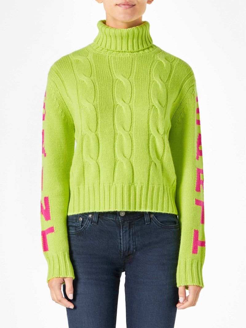 Woman fluo yellow turtleneck braided sweater